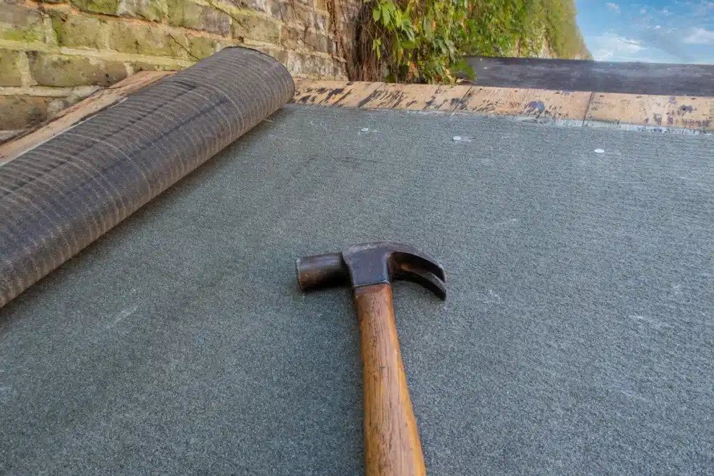 roofing felt and hammer