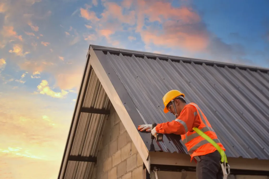 roofer and metal roof slope