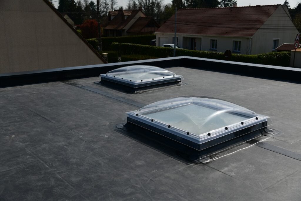 black tpo roofing with skylights
