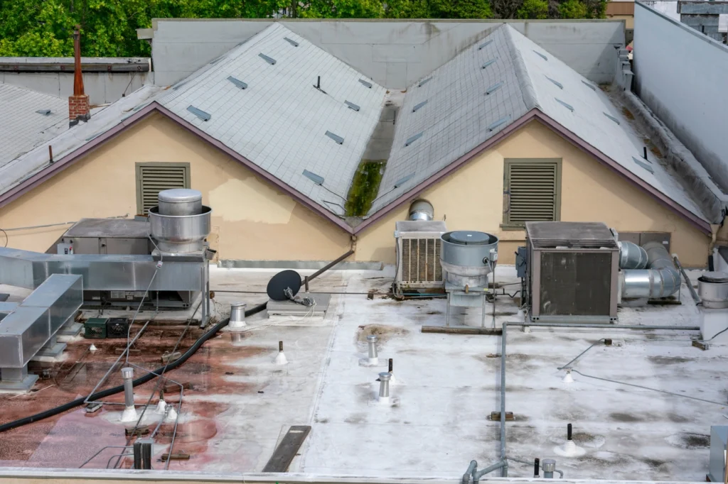aerial view of damaged tpo roofing system