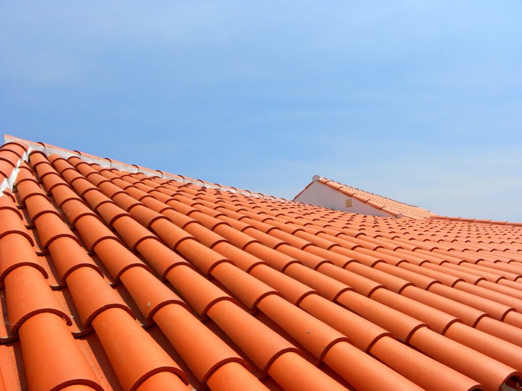 Bright red/orange clay tiles installed on home