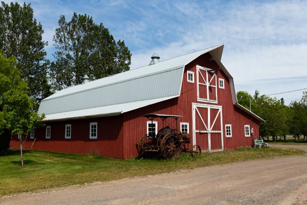 red. barn with metal gambrel roof