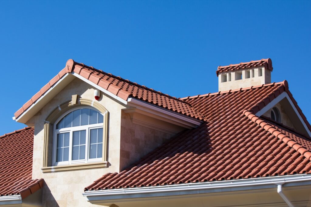 Ceramic spanish tile roof on house