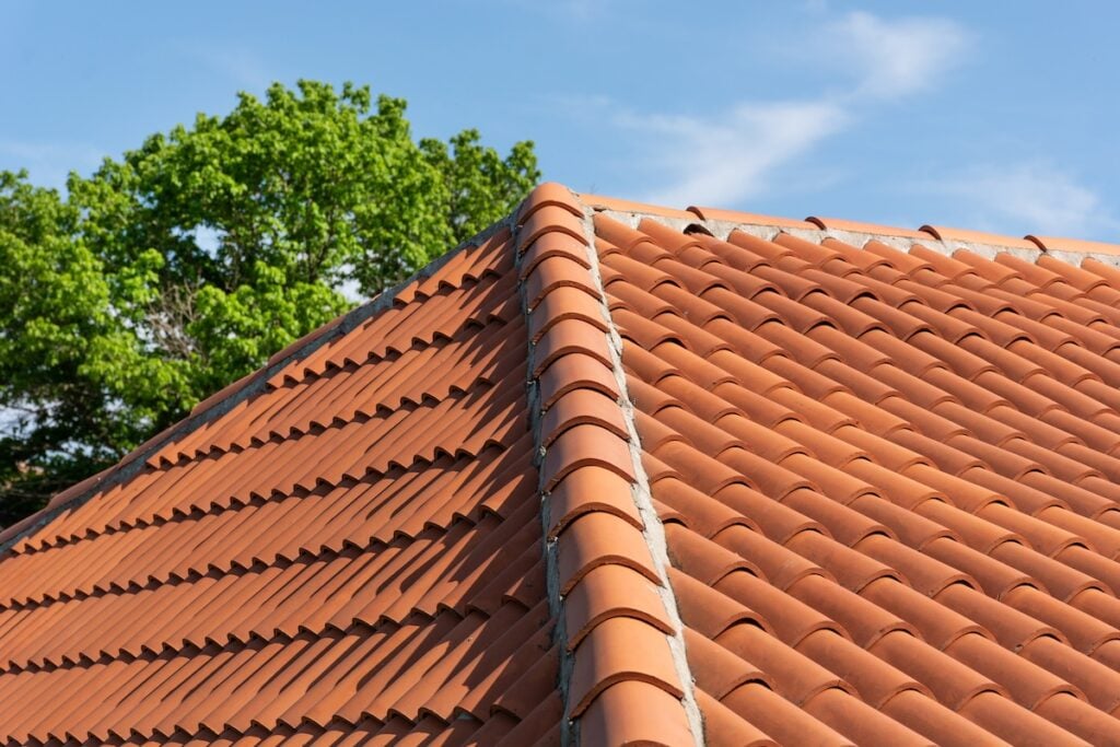 Orange spanish tile roof on house