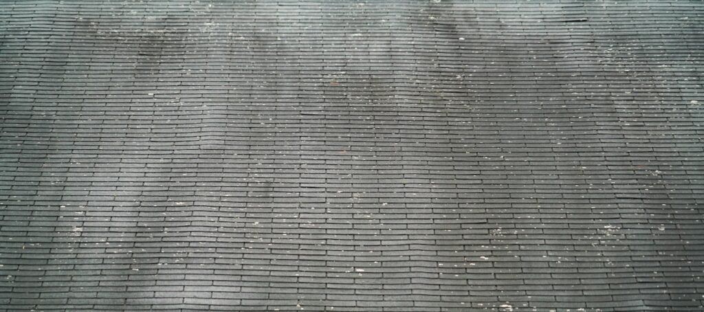 Old dirty roof shingle need replacement
