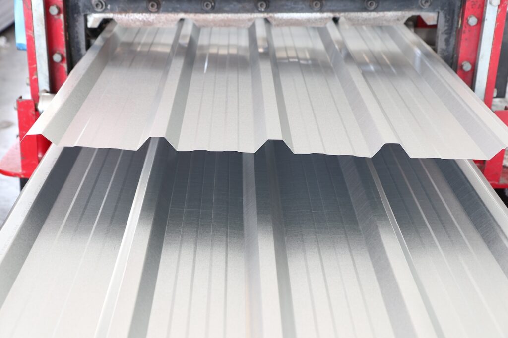 metal sheet roof rolled from rolling machine ; close up