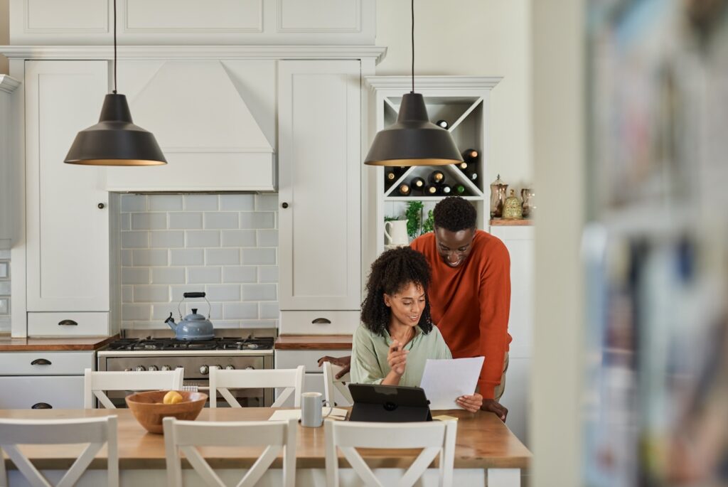 couple looking at metal roof financing